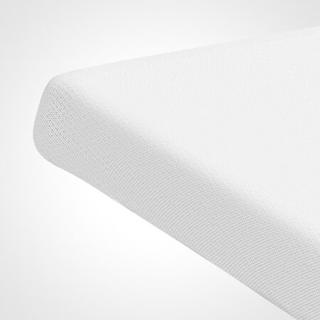 corner of numu air baby mattress with bedsheet on it